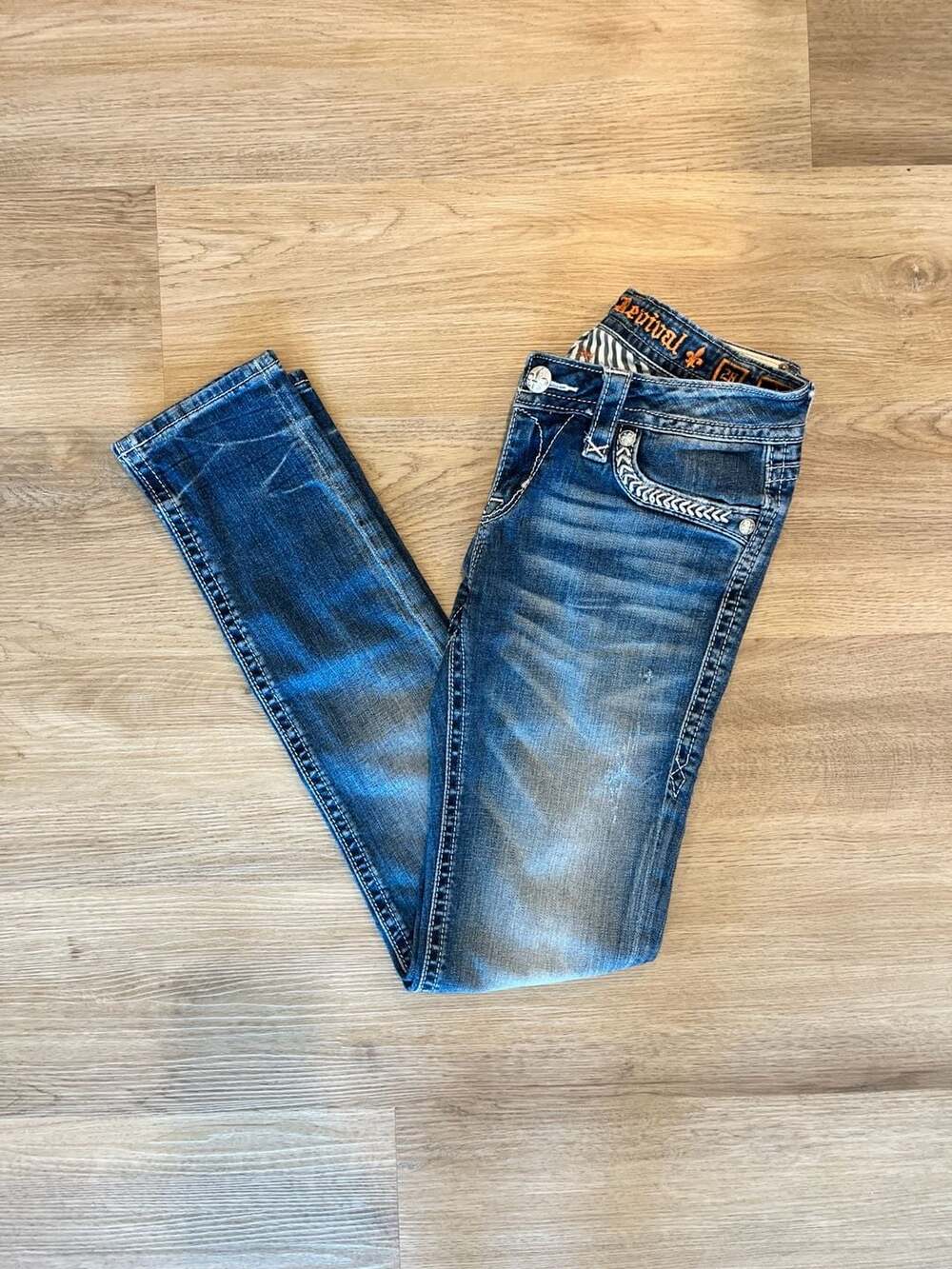 Rock Revival Women's Skinny Jeans in Distressed Blue Denim